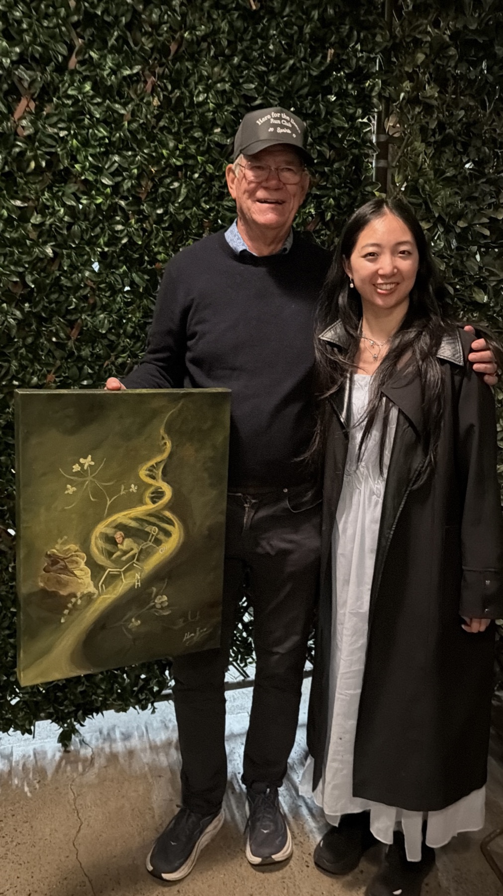 Selena Yang with plant biologist Mark Estelle and the Auxin Growth Factor painting
